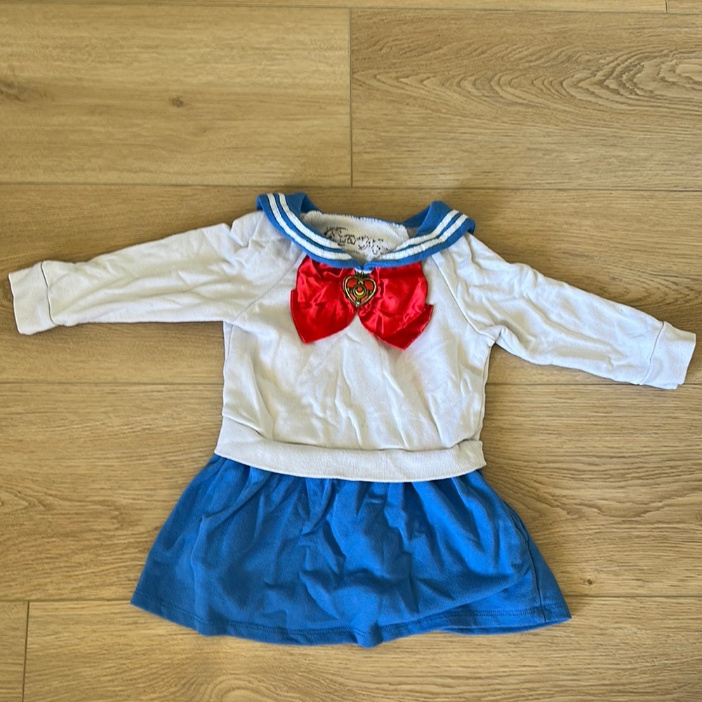 Sailor-Inspired Kids Costume with Red Bow